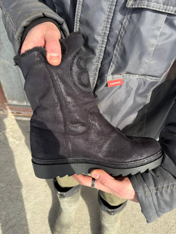 Сбоку